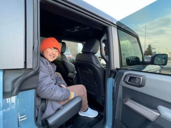 Boy in rear seat of 2021 Ford Bronco Black Diamond
