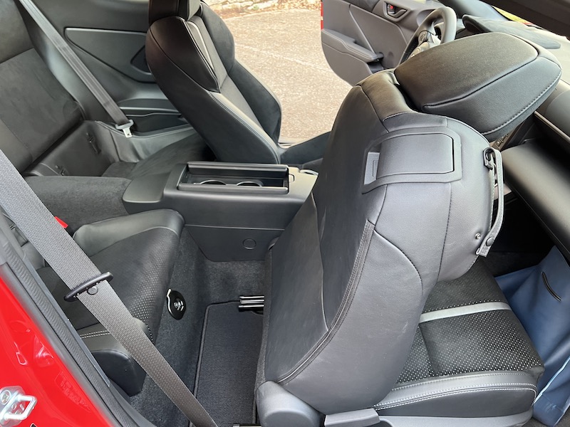 Front seats fold forward to allow rear seat access