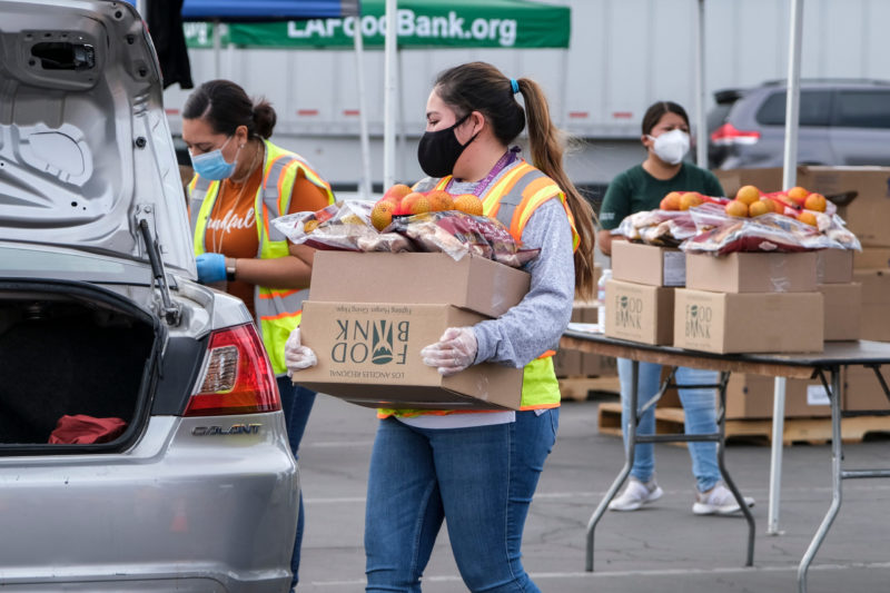 Volunteering with cars at a food bank
