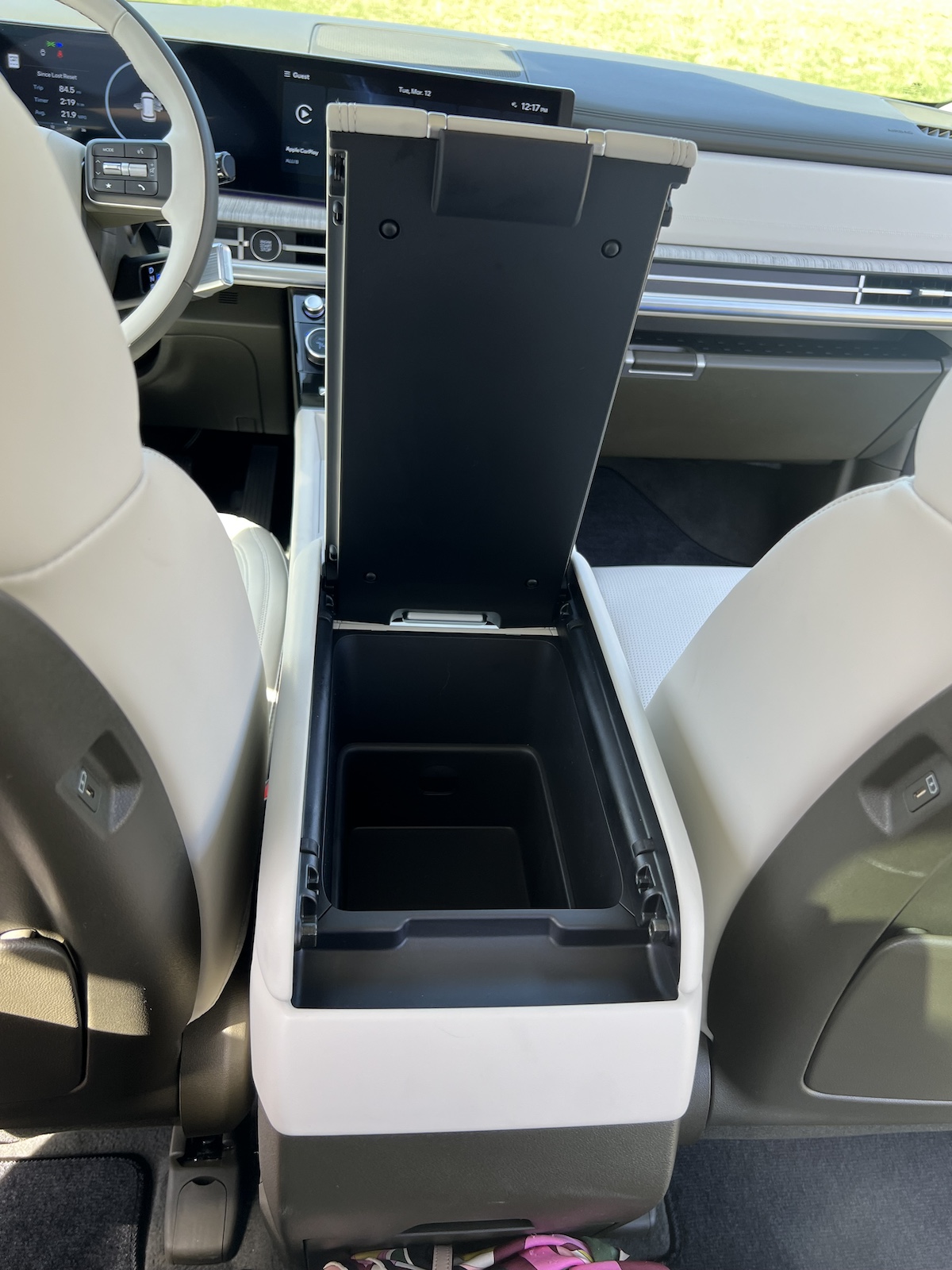 The Center Arm Rest Opens To The Rear Seat So Passengers Can Access It, Too