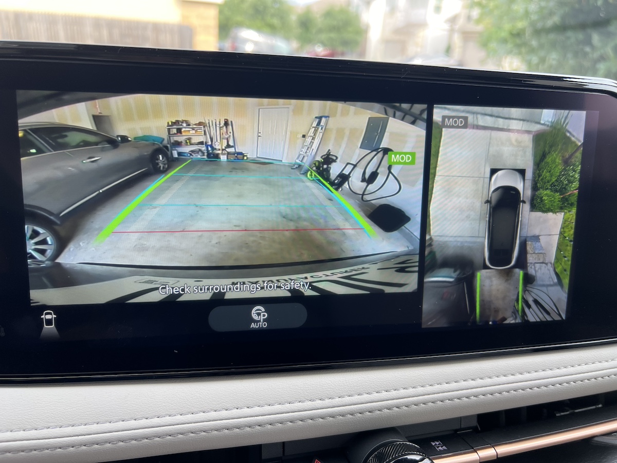 The Rear Of The Nissan Ariya Features A Light Bar Above The Nissan Name