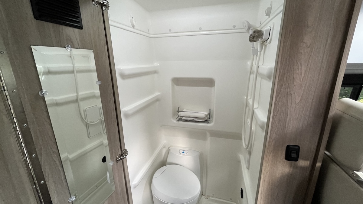 Is Van Life the Ultimate Escape? Exploring Life on the Road in a Winnebago Solis 5 Bathroom In Winnebago Solis Camper Van