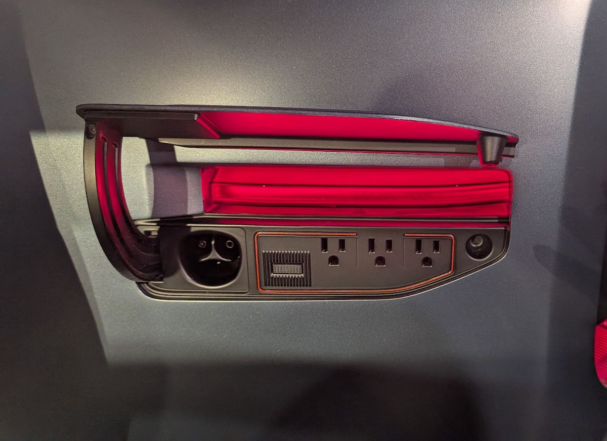 Scout Motors First Look: We Saw The Brand's First Two Models and the Details Are Crazy Good 16 A Girls Guide To Cars | Scout Motors First Look: We Saw The Brand'S First Two Models And The Details Are Crazy Good - Scouts Charge Port Abigail Bassett