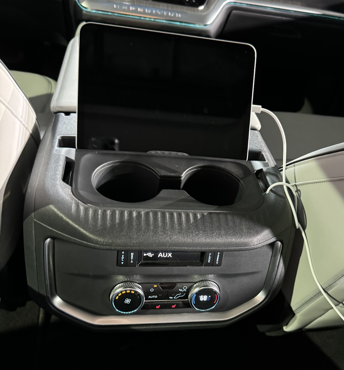 The Center Console Has A Tablet Holder For Rear Seat Passengers