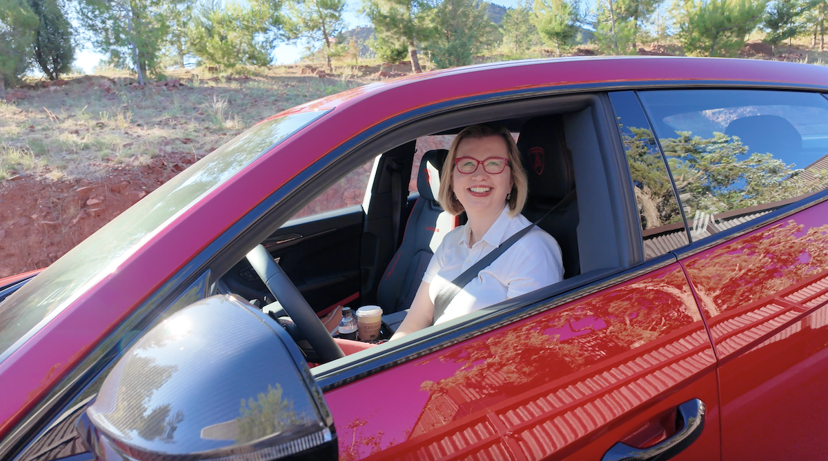 Azra In Her Red Lamborghini Urus