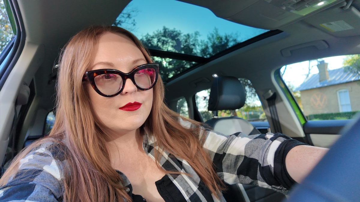 A Girls Guide To Cars | 2025 Vw Taos: Surprisingly Spacious And Tech-Forward—And Not Surprisingly, Fun To Drive - 2025 Vw Taos Front Cabin Alternative Shot In Bright Moss Green With Black White Interior And Panoramic Roof Natalie Merola A Girls Guide To Cars