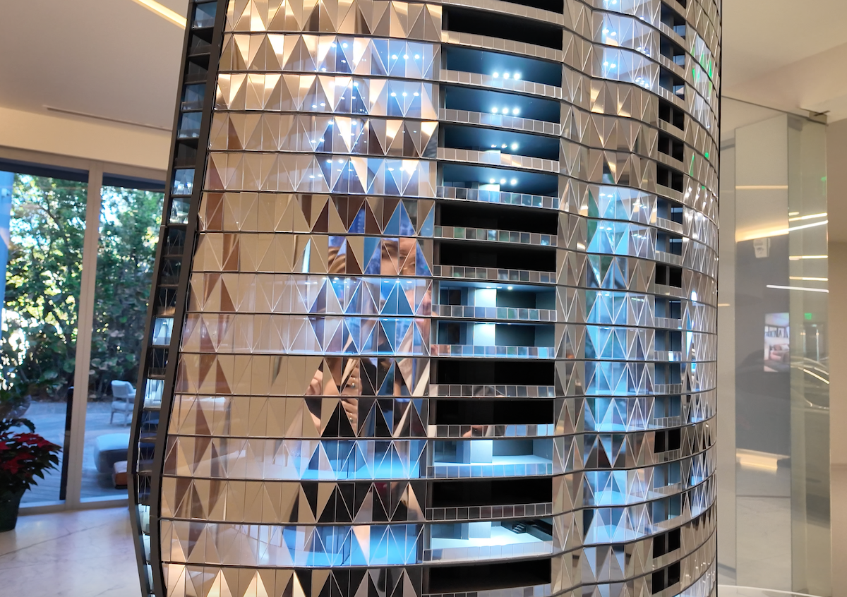 A Scale Model Of The Bentley Residences Tower Shows The Building