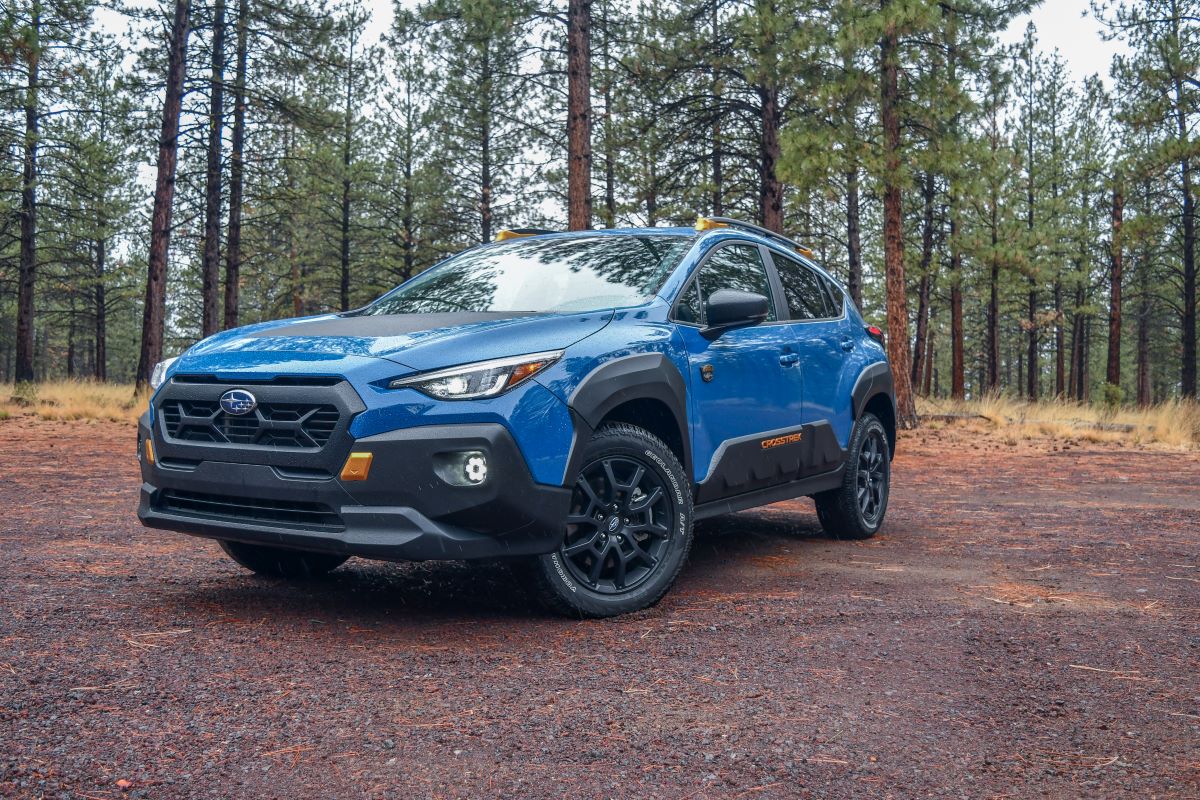 10 Things My Family Loved About the 2024 Subaru Crosstrek Wilderness 8 The 2024 Subaru Crosstrek Wilderness Posed For A Picture On A Rainy Dirt Road