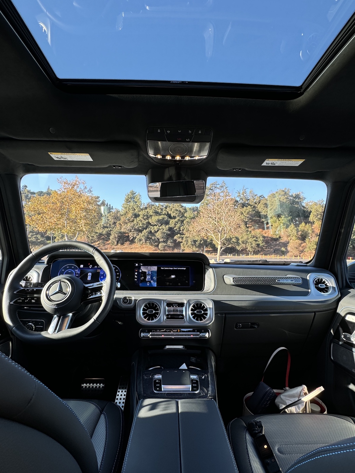 The Front Seat And Sunroof In The 2025 Mercedes-Benz G 580 G-Wagen