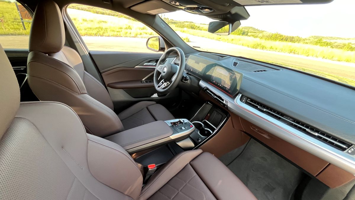 The 2024 BMW X2: This Compact Luxury SUV Has a Whole New Look 5 The Interior Of The 2024 Bmw X2, Showcasing The Brown Leather And Multimedia Center