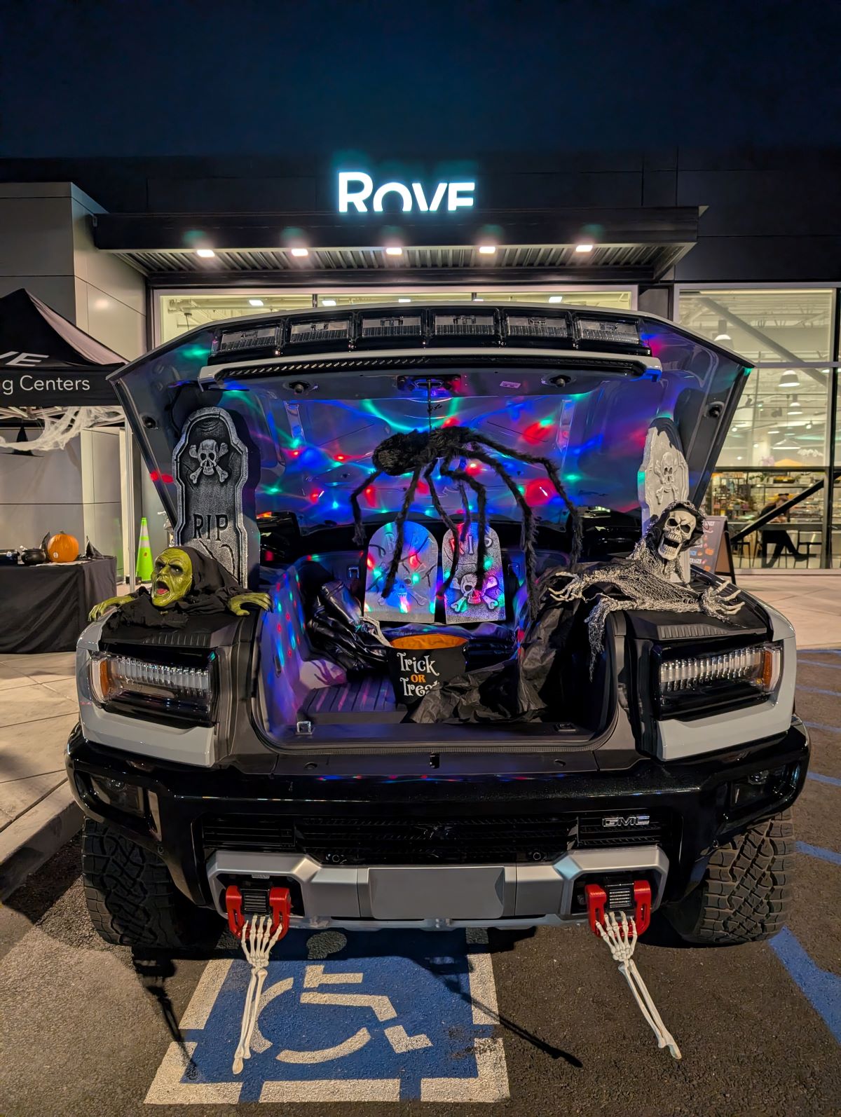 The Gmc Hummer Ev 3X Suv Parked In And Decorated For A Trunk Or Treat Event