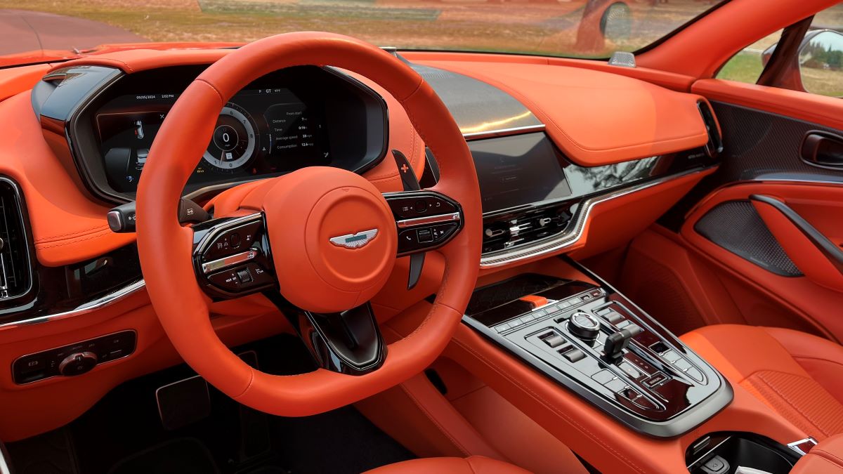 The Bright Orange Interior Of The 2025 Aston Martin Dbx070
