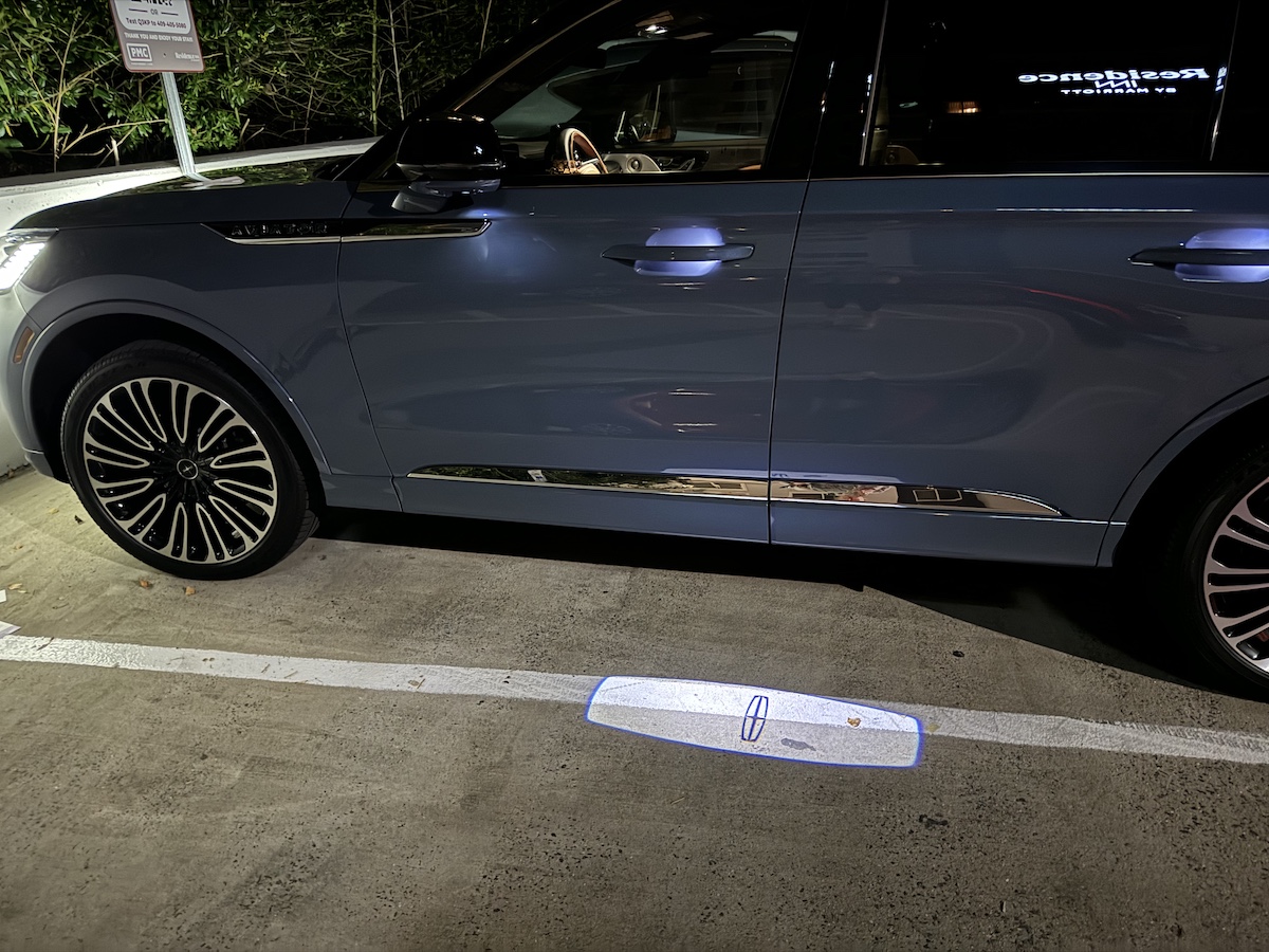 Want a Hidden Gem That Whispers Quiet Luxury? Take the 2025 Lincoln Aviator For a Spin 12 A Puddle Light In The Lincoln Aviator