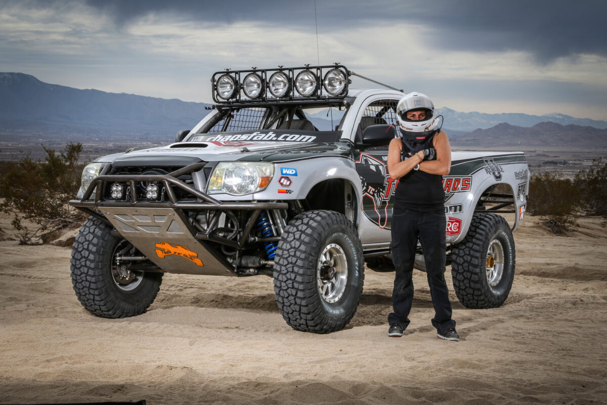 Nicole Standing Next To A Built Truck