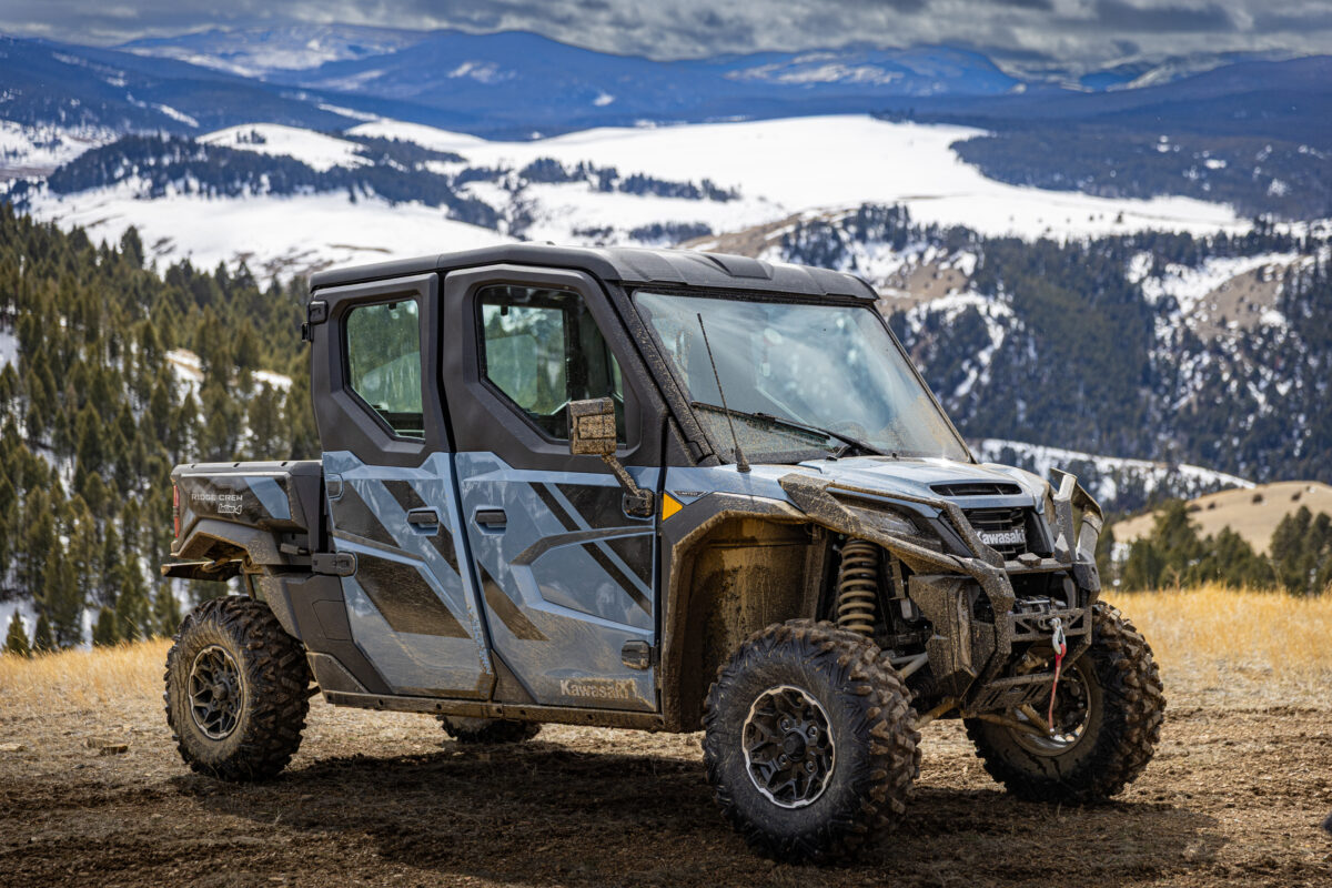 The Kawasaki Ridge Crew Parked In Front Of A Mountain View