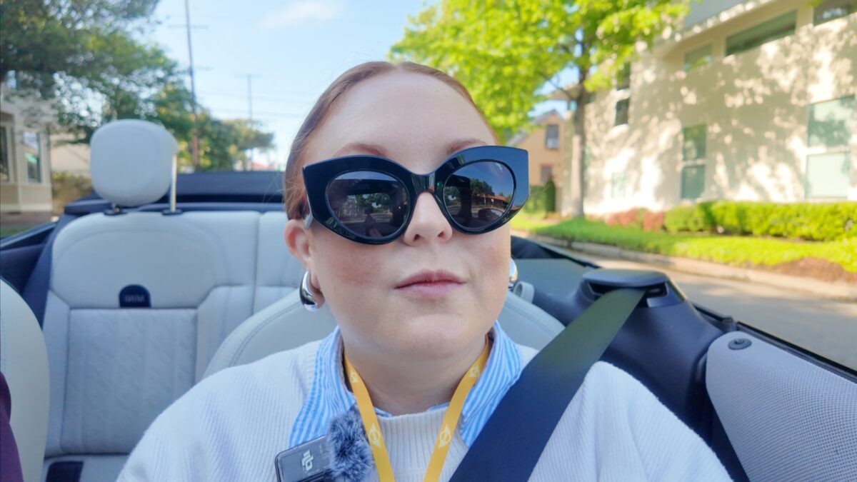Go Ahead, Take it Off: Soak Up the Heritage Charm, Modern Tech in the 2025 MINI Convertible 10 Natalie Taking A Selfie While Driving The New Mini Cooper Convertible
