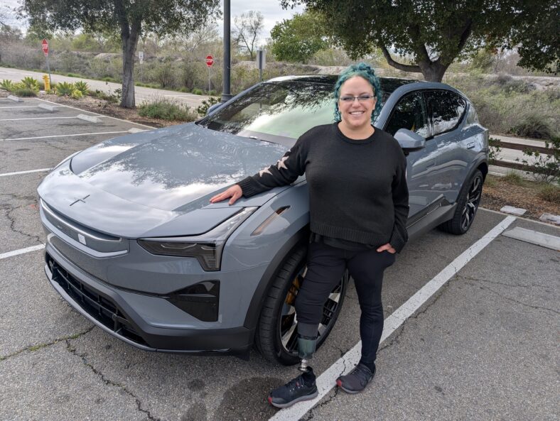 Liv Leigh Standing Next To A Polestar 3