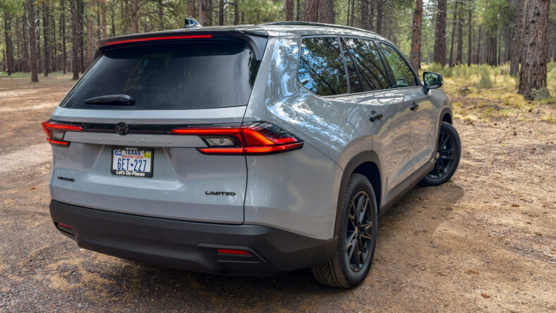 The Rear Quarter Of The 2025 Toyota Grand Highlander Nightshade Hybrid
