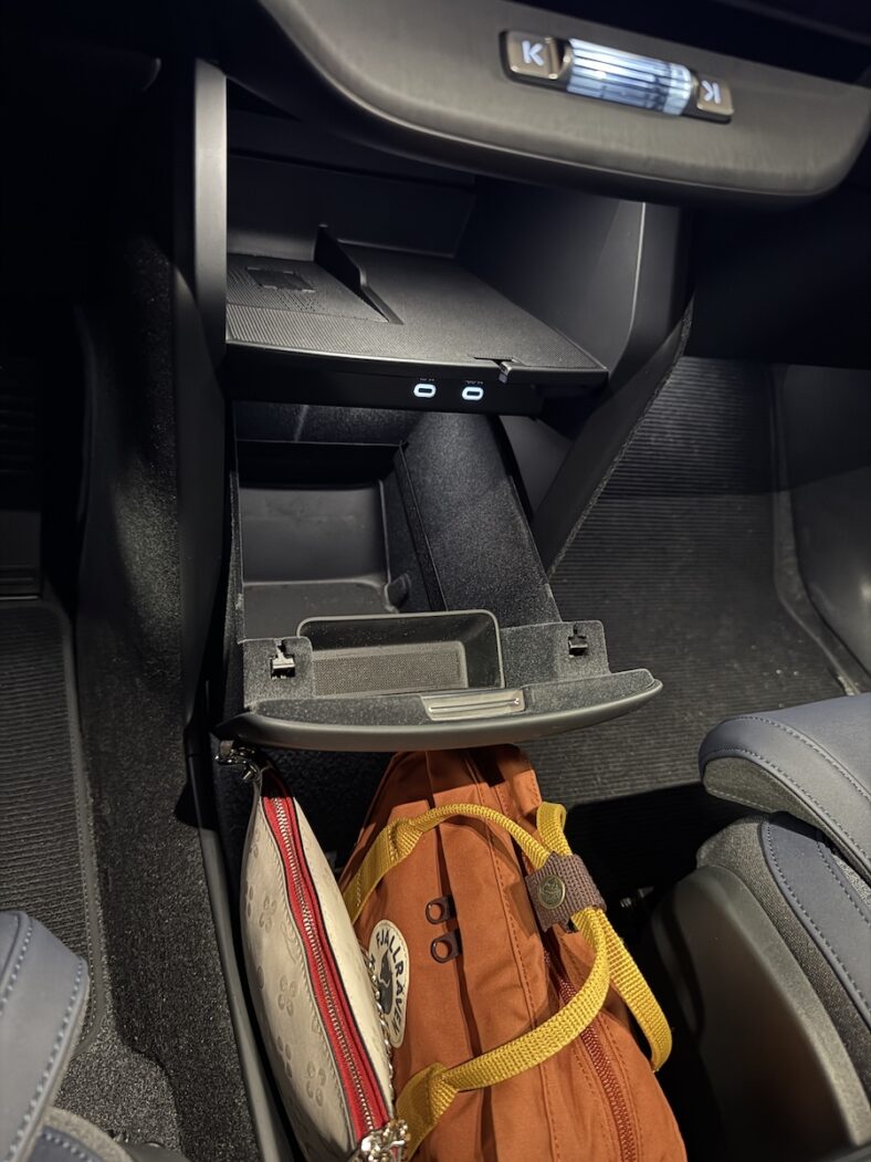 The Handbag Bin And Vertical Glove Box In The Volvo Ex60