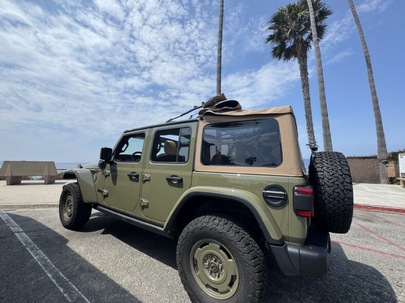 The 2025 Jeep Wrangler 4xe Was Made to Off-Road, But It's a Perfect Fit For Beach Life 4 The 2025 Jeep Wrangler 4Xe Willys Parked With The Sunroof Open