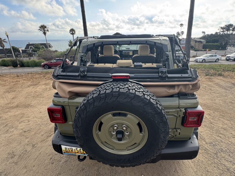The 2025 Jeep Wrangler 4xe Was Made to Off-Road, But It's a Perfect Fit For Beach Life 10 The Top Down On The 2025 Jeep Wrangler 4Xe Willys